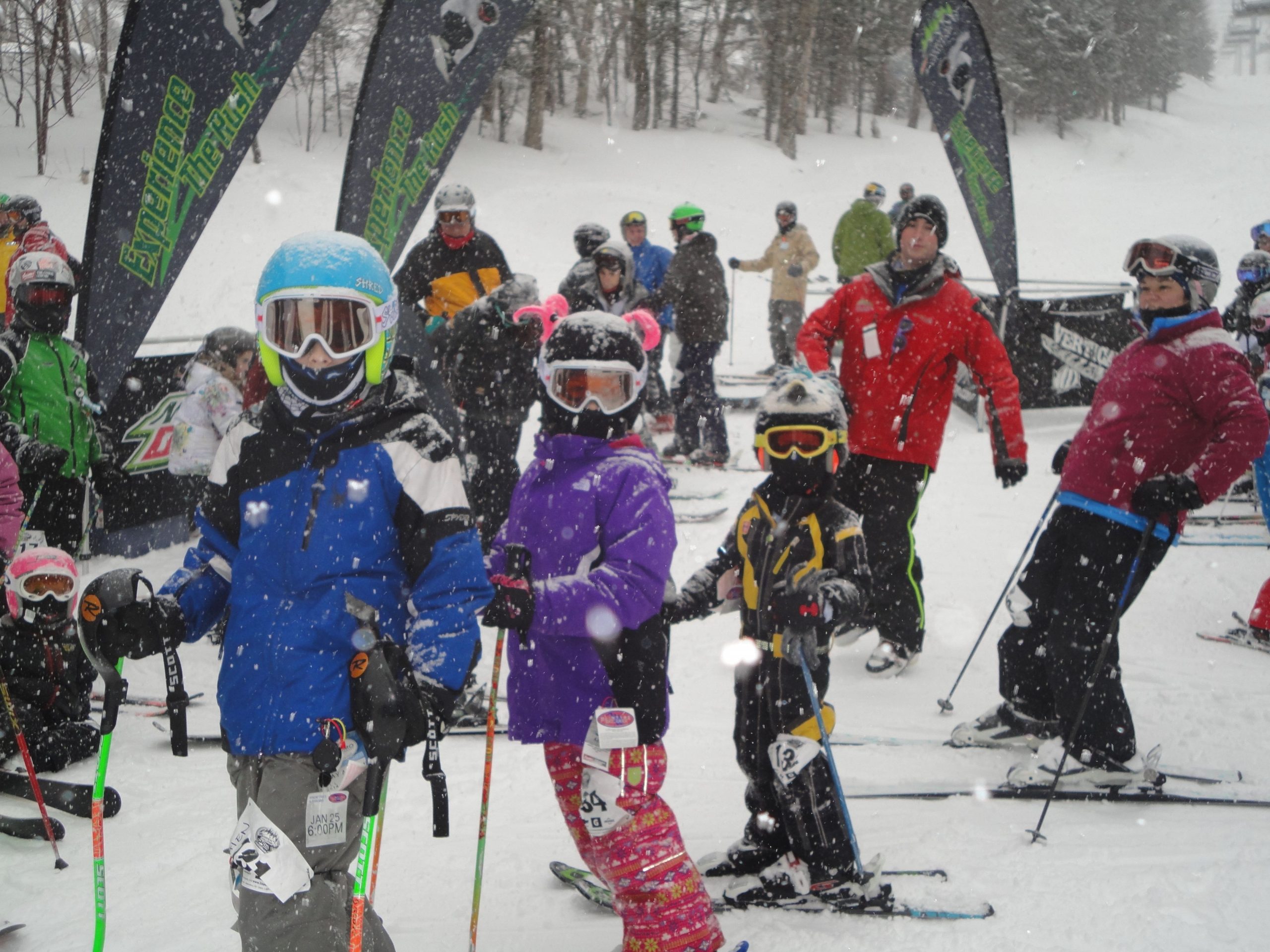 Kids take a ski lesson