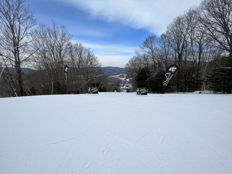 a mountain for skiing and snowboarding covered in heavy snow