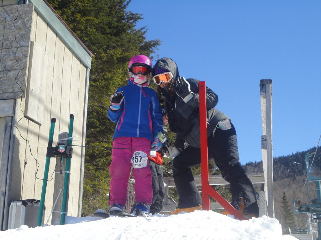 A girl gets ready to ski