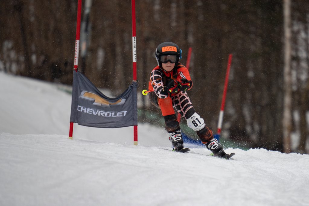 A boy ski racing
